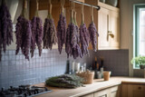 Fototapeta Lawenda - Drying lavender buds hanging in the kitchen  
