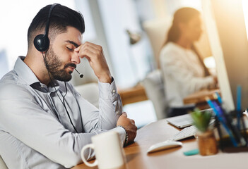 Fototapete - Headache, tired or man in call center with burnout, head pain or overworked in crm communication. Migraine, office or stressed telemarketing sales agent frustrated with anxiety, fatigue or problem