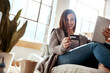 © Grady Reese/peopleimages.com - Smile, tablet and credit card, happy woman on couch in living room and internet banking or fintech in home. Technology, online shopping payment and girl on sofa surfing retail website or digital shop