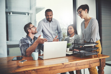 Wall Mural - Planning, laptop and coaching with business people in meeting for project management, review or teamwork. Technology, website and training with group of employees in office for collaboration and idea