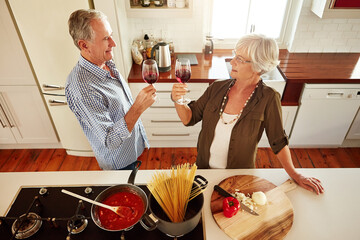 Wall Mural - Toast, wine or old couple cooking food for healthy vegan diet together in retirement at home. Above, cheers or romantic senior woman drinking or toasting in kitchen with a happy husband at dinner