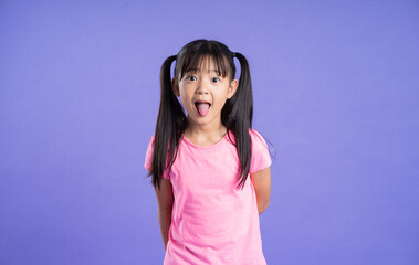 beautiful asian girl portrait posing on purple background