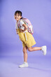 © 1112000 - cute asian baby girl posing on purple background