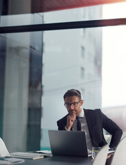 Poster - Business man, computer and planning, thinking or reading, research ideas and financial solution for stock market. Decision, focus and debt review or finance risk choice of corporate person on laptop