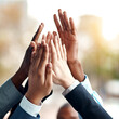 © L De Bruin/peopleimages.com - Business people, hands and high five for teamwork, success and team building. Group, collaboration and employees with hand together for cooperation, support and solidarity, motivation and celebration