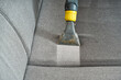 © Ilja - Sofa before and after wet - cleaning indoors. textile sofa vacuum cleaning. professional cleaning service concept.