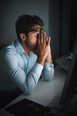 Wall Mural - Stress, night and a businessman with a headache at work, deadline burnout and frustrated. Sad, problem and a corporate employee in a dark office with anxiety or depression from an email on a pc