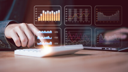 Aufkleber - Businessman using a calculator to calculate numbers,Analyzing and examining profit and loss statement of company's performance ,cost analysis,financial paperwork ,Calculation business balance sheet