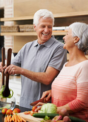 Canvas Print - Cooking, health and laughing with old couple in kitchen for salad, love and nutrition. Happy, smile and retirement with senior man and woman cutting vegetables at home for food, dinner and recipe