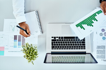 Fototapete - Man hands, documents and notebook writing, data analysis and website growth or planning on laptop or desk. Charts, graphs and stats paperwork of business person ideas, computer and seo research above