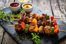 Meat Skewers - Grilled Meat With Vegetables On Wooden Background
