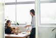 © N Katie/peopleimages.com - Meeting, documents and business women in office with report for planning, strategy and analysis. Communication, teamwork and female workers with paperwork for financial review, analytics and proposal