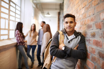 Aufkleber - Education, arms crossed and portrait of man in college hallway for studying, learning or scholarship. Future, school and knowledge with student leaning on brick wall for university, academy or campus