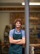 © Mariusz/peopleimages.com - Owner, arms crossed or portrait of man at restaurant for small business, coffee shop or waiter. Entrepreneur, happy smile and male barista at front door of cafe for diner and food industry confidence