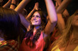 © Yuri Arcurs/peopleimages.com - Music, dance and party with woman at concert for rock, live band performance and new year celebration. Festival, disco and energy with girl in crowd of fans for nightclub, rave and techno show event