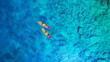 Kayaking. Aerial view of floating kayaks and people on blue sea at sunny day. Travel and active life image. Summertime vacation. Mediterranean sea.
