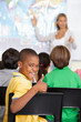 © Cameron Mcdonald/peopleimages.com - Black child, portrait and thumbs up of student in class, elementary school or classroom. Funny, education and kid with hand gesture for like emoji, agreement or learning, success and approval sign.