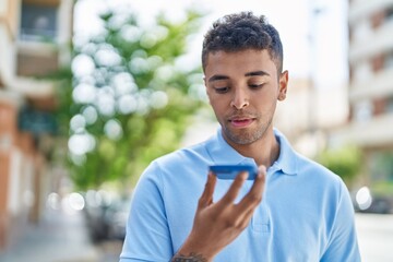 Poster - African american man talking on the smartphone at street