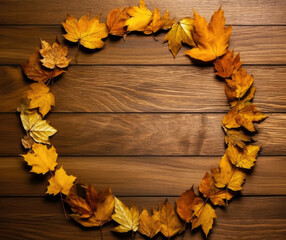 Poster - Autumn leaves circle on wooden background with copy space for your text.