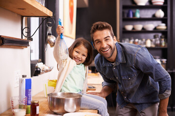 Cooking, breakfast and portrait of father with daughter in kitchen for pancakes, bonding or learning. Food, morning and helping with man and young girl in family home for baking, playful or nutrition