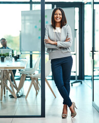 Portrait, business and woman with arms crossed, smile and startup success in a modern office. Face, female person and employee with confidence, motivation and career with professional and leadership