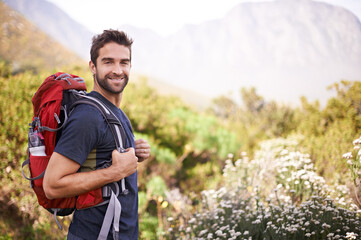 hiking, happy and portrait of man on mountain for fitness, adventure and travel journey. backpacking