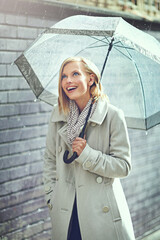 Poster - Umbrella, city rain and excited woman with happiness on a sidewalk from winter weather. Happy female person, raining and travel on a urban road outdoor in Cape Town on holiday with freedom and joy