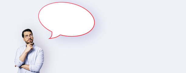 Aufkleber - Attractive young european businesswoman with speech bubble on wide white background. Opinion, speech and communication concept. Mock up place.