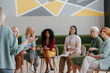 © gstockstudio - Group of mature women listening to speaker while visiting business conference