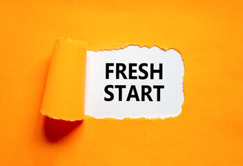 Wall Mural - Fresh start and motivational symbol. Concept words Fresh start on beautiful white paper. Beautiful orange table orange background. Business motivational and Fresh start concept. Copy space.