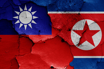 Wall Mural - flags of Taiwan and North Korea painted on cracked wall