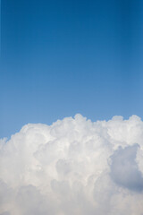 Wall Mural - blue sky with cloud closeup. natural background and texture for design.