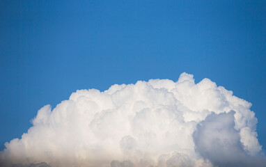 Wall Mural - blue sky with cloud closeup. natural background and texture for design.