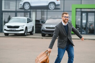 Wall Mural - Portrait of happy customer buying new car.