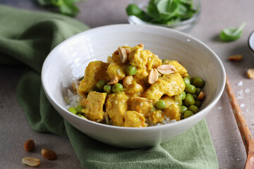 Wall Mural - Chicken in curry sauce served in bowl