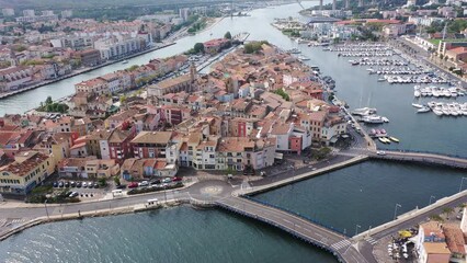 Wall Mural - Aerial view of Provencale Venice, French seaside town of Martigues on Mediterranean coast overlooking old districts on banks of canals and marina in summer 