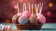 Delicious rainbow color cake pops decorated with frosting chocolate and sprinkles.  Generative Ai