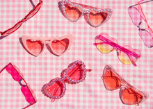 Summer Creative Layout With Heart Sunglasses On Pastel Pink Plaid  Background. 80s Or 90s Retro Aesthetic Idea. Minimal Summer Fashion Idea.