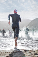 Triathletes at start of swimming race