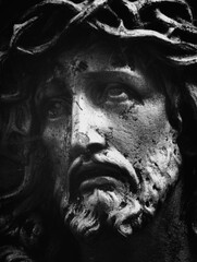 Wall Mural - Close up fragment of old statue of Jesus Christ crown of thorns. Black and white image.