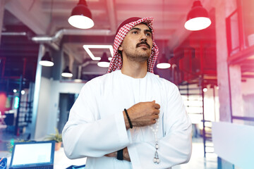 Sticker - Successful muslim businessmen in traditional outfit in his office