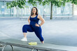 Low Impact Workouts, low threat beginner exercise to improve overall well-being. lose weight with low impact workouts. Plus size curvy woman doing Low Impact Workouts exercise outdoors.
