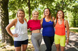 © baranq - Female friendship. Happy group of women standing in park after outdoor exercise class