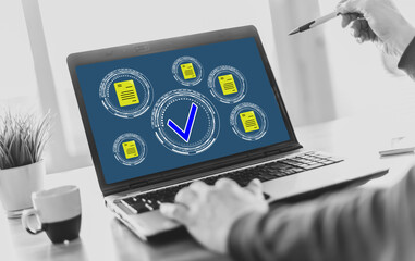 Wall Mural - Document validation concept on a laptop screen