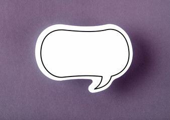 The Speech bubble with copy space communication talking speaking concepts on purple background.