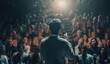 © ayselucar - Young person Speaker or talking on stage with spotlight and many people listening. Business mindset or conversation convince concepts.power of voice. Generative AI