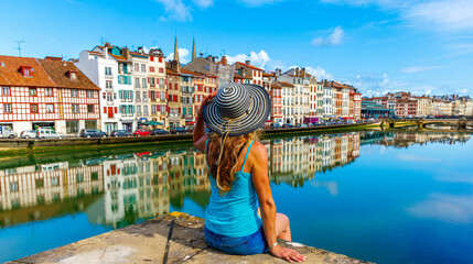 Wall Mural - woman tourist in bayonne- france, basque country