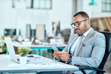 Canvas Print - Phone, typing and business man in office communication, networking and reading social media or job email. Cellphone, connection or online search of happy african person on mobile app or startup chat