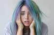 Face of teen girl with colored hair. Expression of lonely, sad female teenager. Depression, pain, suffering. Generative AI.
