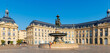 Woman tourist visiting Bordeaux city in France,  La bourse square with fountain- Nouvelle aquitaine